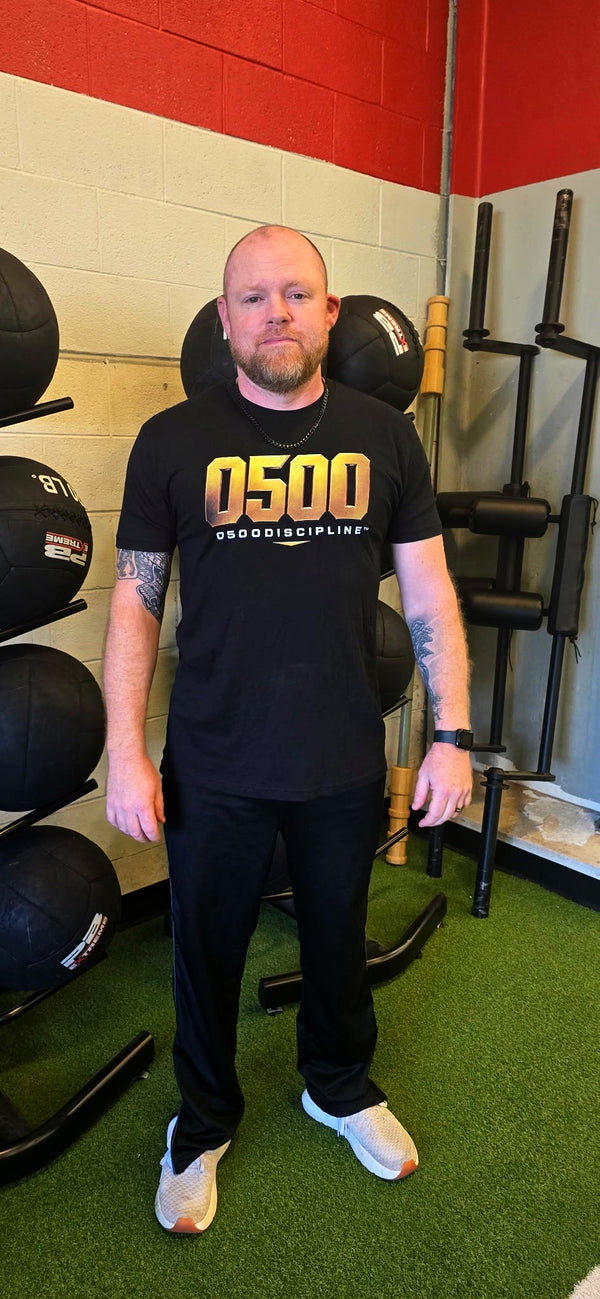 0500DISCIPLINE™ Graphic T-Shirt – Bold Gold 0500 Logo | Motivational Fitness & Lifestyle Tee